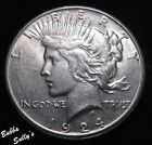 New Listing1924 S Peace Silver Dollar ABOUT UNCIRCULATED