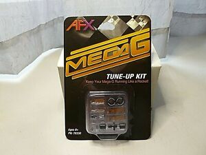 NEW AFX MEGA G+ CHASSIS TUNE-UP KIT PICKUP SHOES,AXLE AND SPRINGS AND TIRES NEW
