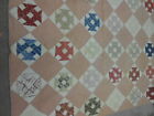 VINTAGE HAND STITCHED MULTI COLORED QUILT    56 X 70