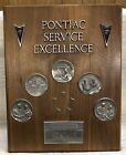 VINTAGE 1987 PONTIAC SERVICE EXCELLENCE AWARD WITH MEDALLIONS MADE OF METAL