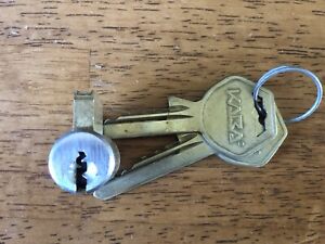 Key in knob cylinder with LORI 90 keyway and two working KABA keys Locksmith