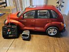 Red New Bright 1/6 Scale RC 9.6v PT Cruiser  w/Remote 27 MHz Used