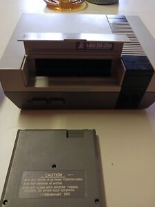 New Listingnintendo lot console With 2 Games And 1 Controller