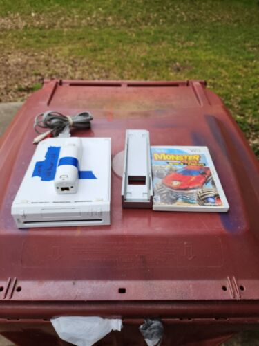 Nintendo Wii Console Bundle - White. No power cord. Includes game,stand remote