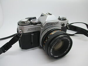 Canon AE-1 35mm SLR Film Camera with Canon 50mm f/1.8 FD Lens - WORKING PERFECT!