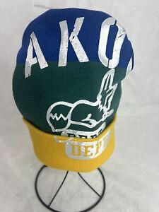 AKOO STAMPED KNIT HAT-old Gold