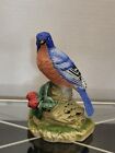 vintage blue bird porcelain Figurine Berries Perched On Rocks