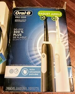 New ListingOral-B Pro 1000 CrossAction Electric Toothbrush, Black and White, 2 Count - OB