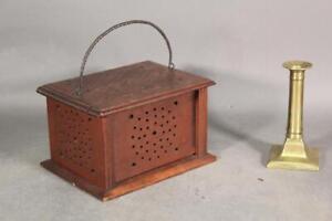 A RARE 18TH C CT HOLE DECORATED WOODEN CHERRY FOOT WARMER IN ORIGINAL RED PAINT