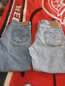 Lot of 2 Levi's 550 Relaxed Fit Blue Jeans Men's Size 34x30 some stains