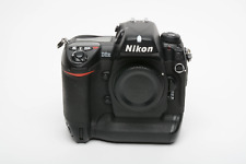 Nikon D2H DSLR Body, 2batts, charger, 8GB CF, strap, 7,821K Acts! tested, great