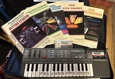 Casio Vintage PT-87 Mini Keyboard w/ ROM Packs RO-551 & RO-275 Bag & Booklets VG